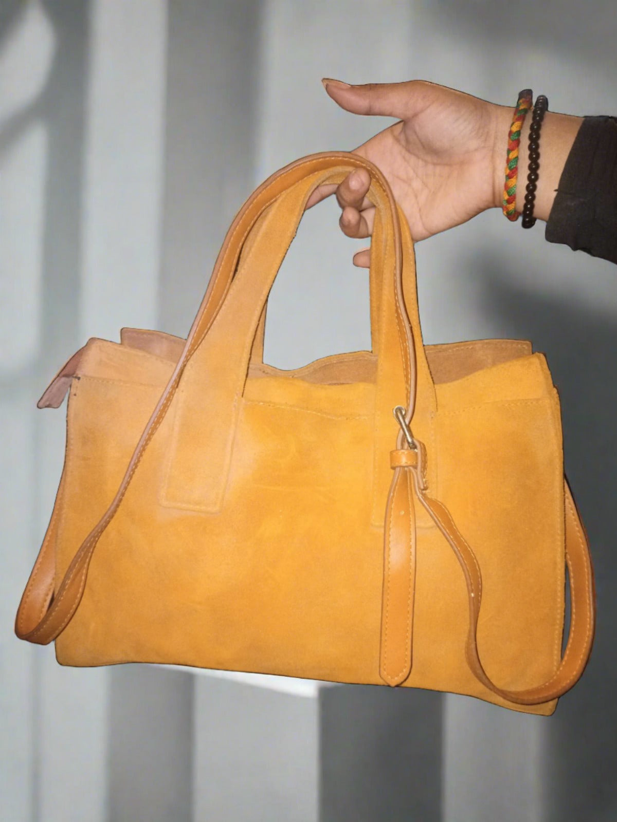 PILLAA Women Leather Brown Handheld Bag," Carry your belongings in style".
